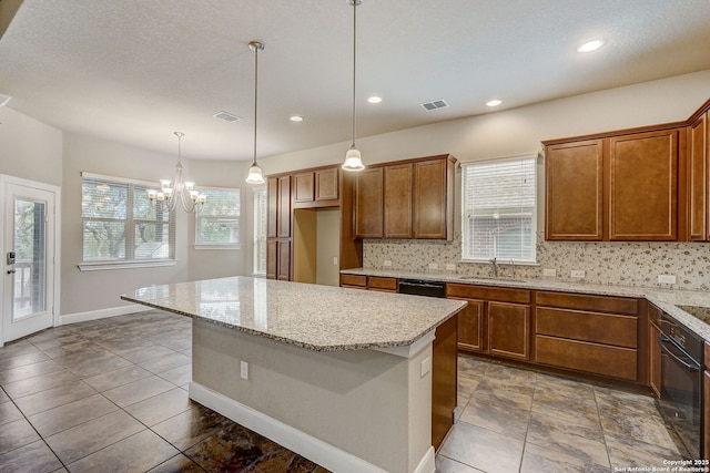 3419 Cherokee, San Antonio, TX 78253 - kitchen with a sink, black appliances, backsplash, a chandelier, and brown cabinetry