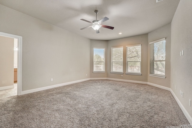 3419 Cherokee, San Antonio, TX 78253 - empty room with light carpet, ceiling fan, healthy amount of natural light, and baseboards