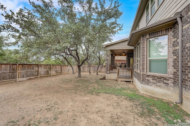 3419 Cherokee, San Antonio, TX 78253 - fenced backyard featuring a ceiling fan