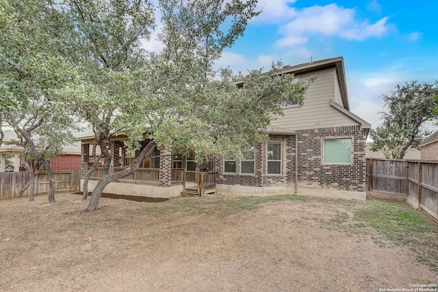 3419 Cherokee, San Antonio, TX 78253 - back of property featuring brick siding and a fenced backyard