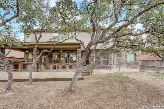 3419 Cherokee, San Antonio, TX 78253 - view of front of home with brick siding, covered porch, and fence