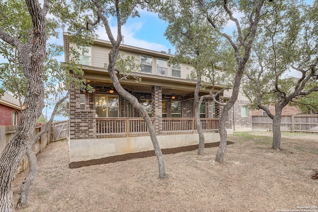 3419 Cherokee, San Antonio, TX 78253 - rear view of property featuring a fenced backyard and brick siding