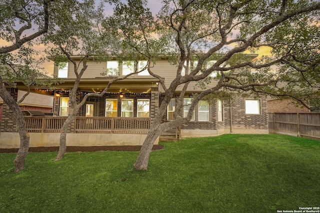 3419 Cherokee, San Antonio, TX 78253 - back of house at dusk with brick siding