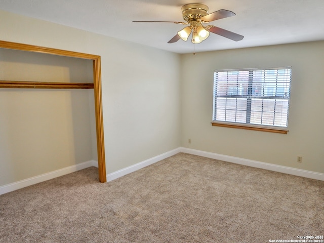 6718 Congressional Blvd, San Antonio, TX 78244 - unfurnished bedroom featuring carpet flooring, a closet, baseboards, and a ceiling fan