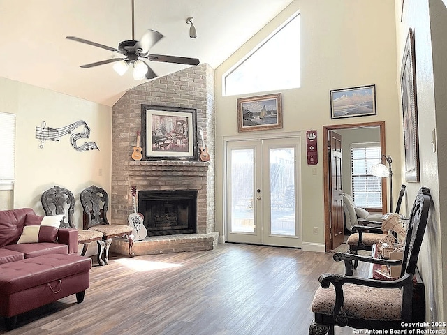 6718 Congressional Blvd, San Antonio, TX 78244 - living area featuring ceiling fan, a brick fireplace, wood finished floors, french doors, and high vaulted ceiling