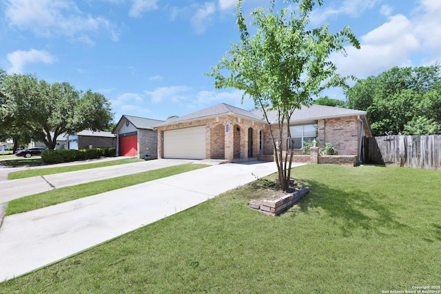 807 S Ellison Dr, San Antonio, TX 78245 - ranch-style house featuring an attached garage, brick siding, and concrete driveway