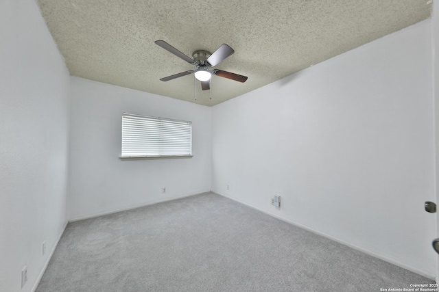 807 S Ellison Dr, San Antonio, TX 78245 - carpeted spare room featuring a ceiling fan and a textured ceiling