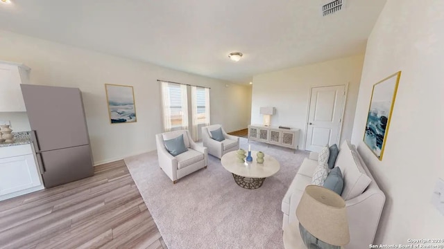 5631 Finch Cyn, Converse, TX 78109 - living area featuring light wood finished floors and baseboards