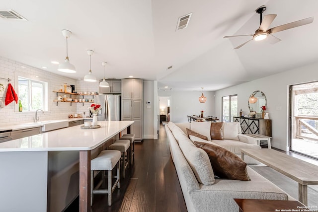 9811 Rebel Queen, San Antonio, TX 78255 - living room with dark wood-style floors, ceiling fan, and recessed lighting