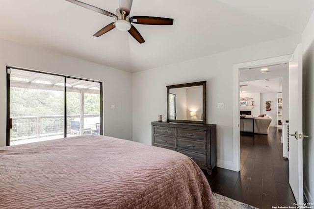 9811 Rebel Queen, San Antonio, TX 78255 - bedroom featuring access to exterior, dark wood-type flooring, lofted ceiling, ceiling fan, and baseboards