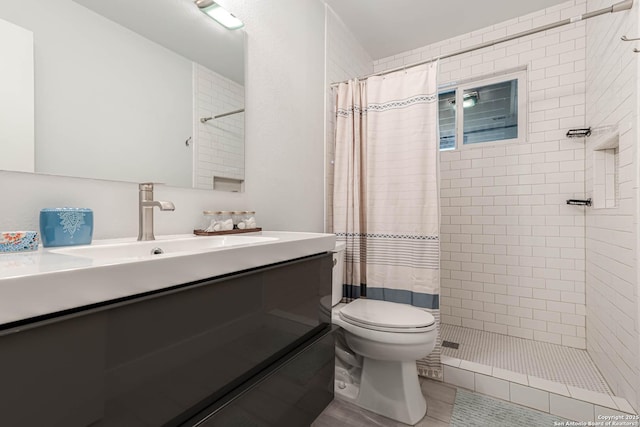 9811 Rebel Queen, San Antonio, TX 78255 - full bath featuring a tile shower, toilet, and vanity