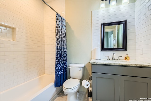 1130 Wyoming St Unit B, San Antonio, TX 78203 - bathroom featuring toilet, vanity, shower / bath combo, and tile patterned flooring