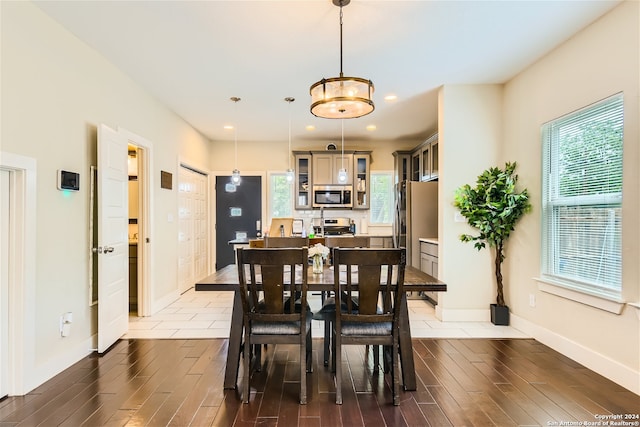 1130 Wyoming St Unit B, San Antonio, TX 78203 - dining room with wood finished floors, baseboards, and recessed lighting
