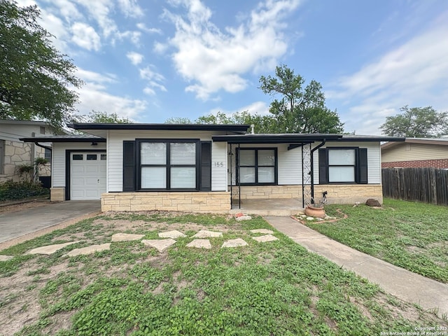 155 Eland, San Antonio, TX 78213 - mid-century modern home featuring a garage, driveway, and covered porch