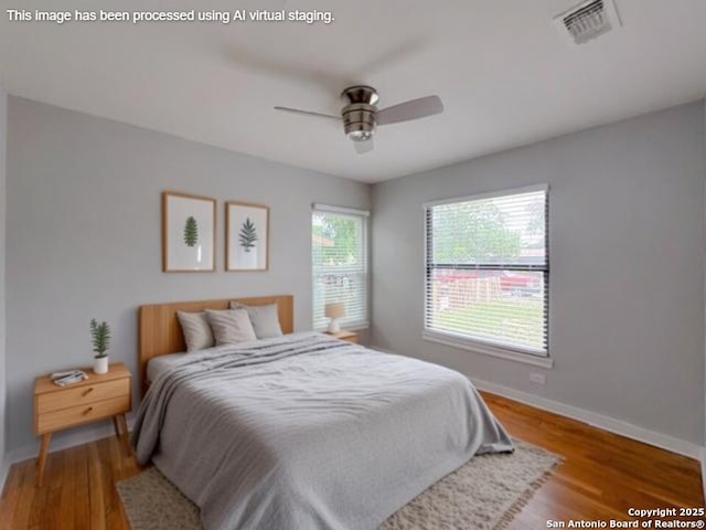 155 Eland, San Antonio, TX 78213 - bedroom with baseboards, wood finished floors, and ceiling fan