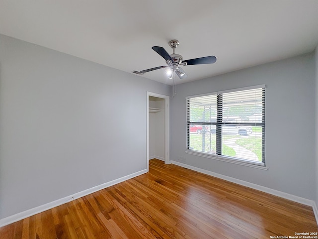 155 Eland, San Antonio, TX 78213 - spare room with baseboards, wood finished floors, and a ceiling fan