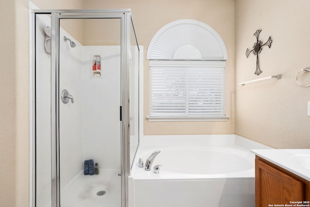 3136 San Miguel, New Braunfels, TX 78132 - full bath featuring a shower stall, a garden tub, and vanity
