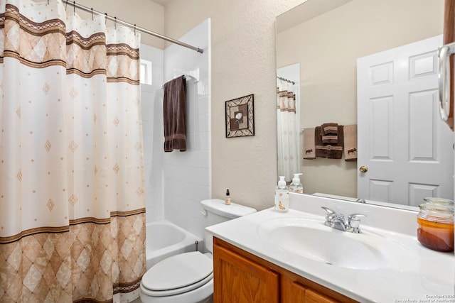 3136 San Miguel, New Braunfels, TX 78132 - full bath with toilet, vanity, shower / bath combo with shower curtain, and a textured wall