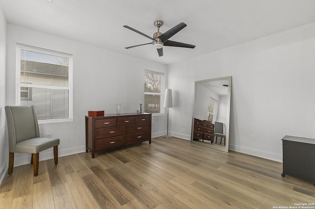 1527 W French Pl, San Antonio, TX 78201 - bedroom with wood finished floors, baseboards, and a ceiling fan