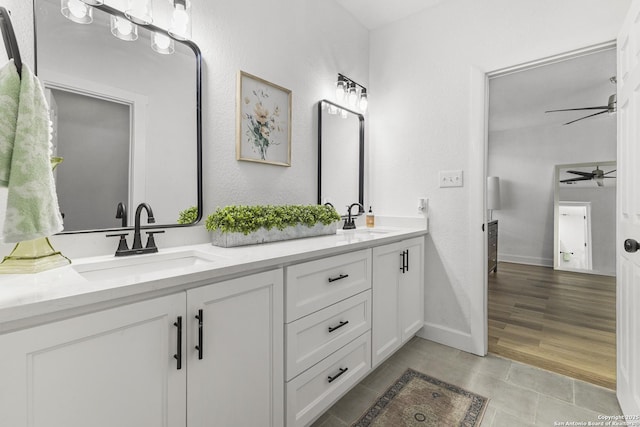 1527 W French Pl, San Antonio, TX 78201 - full bathroom featuring ceiling fan, double vanity, and baseboards