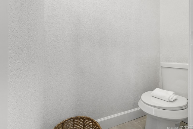 1527 W French Pl, San Antonio, TX 78201 - bathroom featuring tile patterned floors, baseboards, and toilet