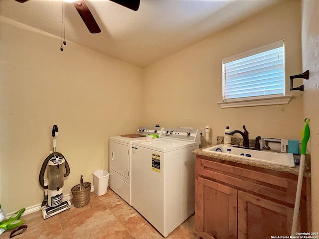 3389 Fm 888, Beeville, TX 78102 - laundry room featuring washing machine and clothes dryer, cabinet space, a ceiling fan, and light tile patterned flooring