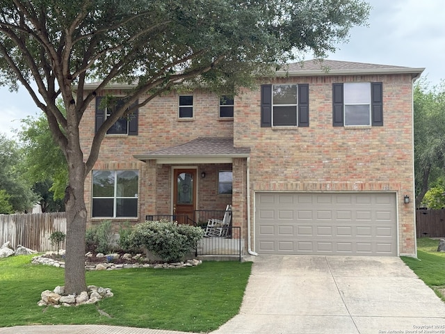 1227 Sun Spg, San Antonio, TX 78245 - traditional-style home with an attached garage, concrete driveway, brick siding, and roof with shingles