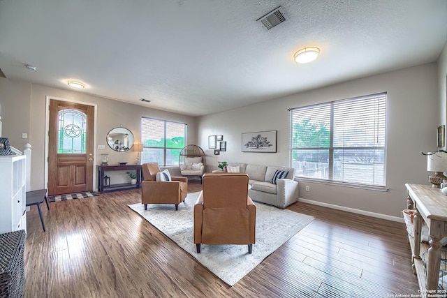1227 Sun Spg, San Antonio, TX 78245 - living area featuring wood finished floors and baseboards