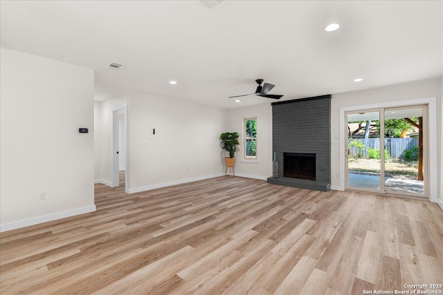 unfurnished living room with a ceiling fan, baseboards, light wood-style floors, and recessed lighting