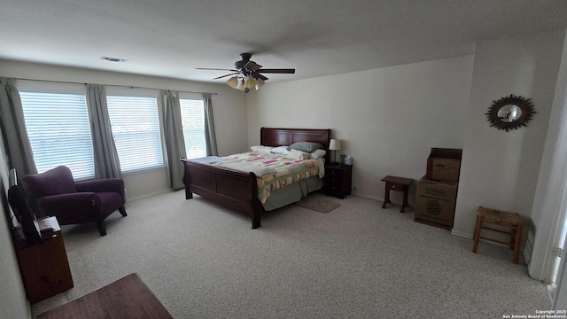 9406 Vallecito Pass, San Antonio, TX 78250 - carpeted bedroom featuring baseboards and a ceiling fan