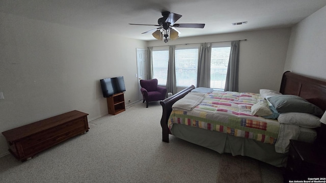 9406 Vallecito Pass, San Antonio, TX 78250 - bedroom with light carpet and ceiling fan