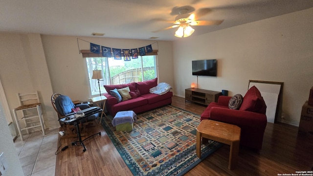 9406 Vallecito Pass, San Antonio, TX 78250 - living room featuring wood finished floors, a ceiling fan, and baseboards