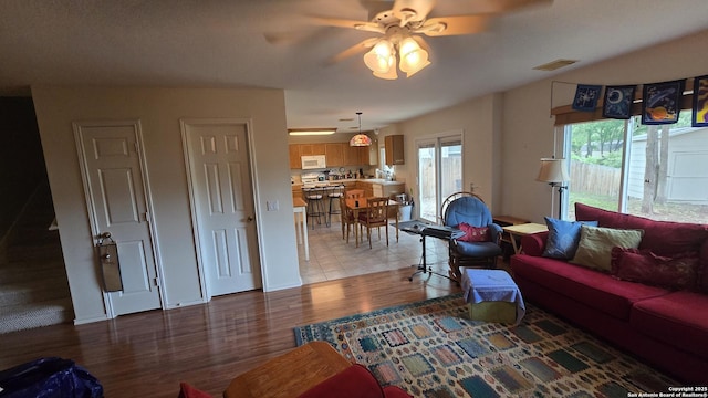 9406 Vallecito Pass, San Antonio, TX 78250 - living area featuring light wood finished floors and a ceiling fan