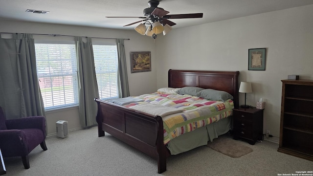 9406 Vallecito Pass, San Antonio, TX 78250 - carpeted bedroom with ceiling fan and baseboards