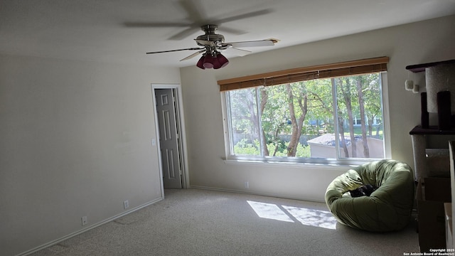 9406 Vallecito Pass, San Antonio, TX 78250 - spare room featuring carpet, baseboards, and ceiling fan