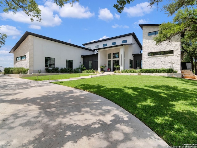 756 Annabelle Ave, Bulverde, TX 78163 - view of front of home with a front lawn, stone siding, and stucco siding