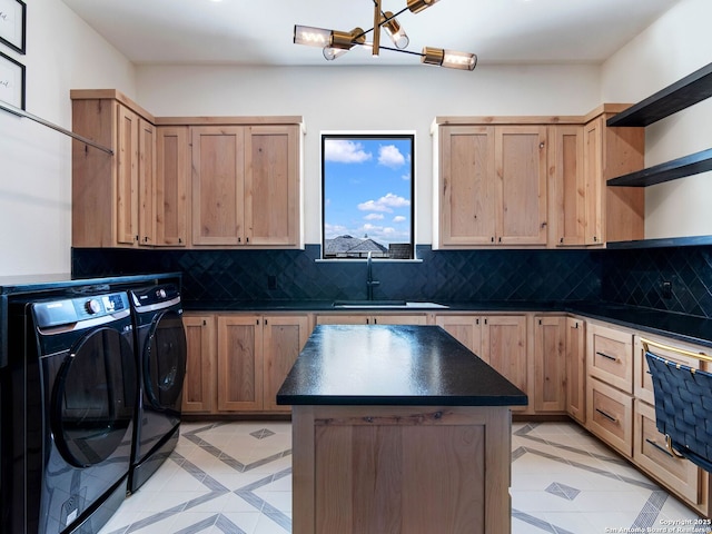756 Annabelle Ave, Bulverde, TX 78163 - kitchen featuring open shelves, dark countertops, washing machine and dryer, light tile patterned floors, and a sink