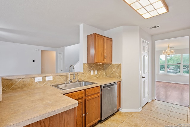15603 Hastings Park, Selma, TX 78154 - kitchen with a sink, dishwasher, decorative backsplash, light countertops, and a chandelier