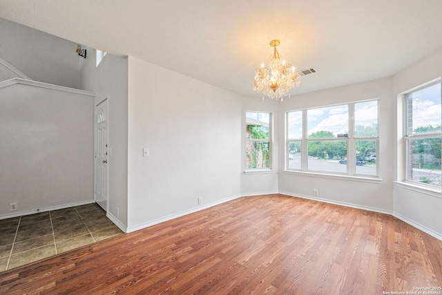 15603 Hastings Park, Selma, TX 78154 - unfurnished room with a chandelier, wood finished floors, and baseboards