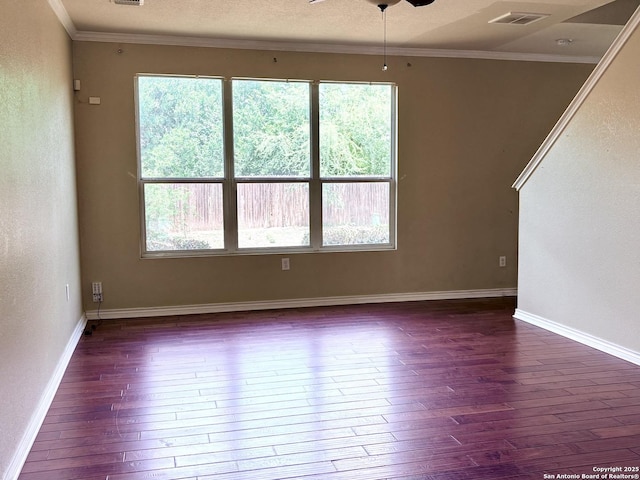 2211 Mission Verde, San Antonio, TX 78223 - unfurnished room with ceiling fan, wood-type flooring, crown molding, baseboards, and a textured wall