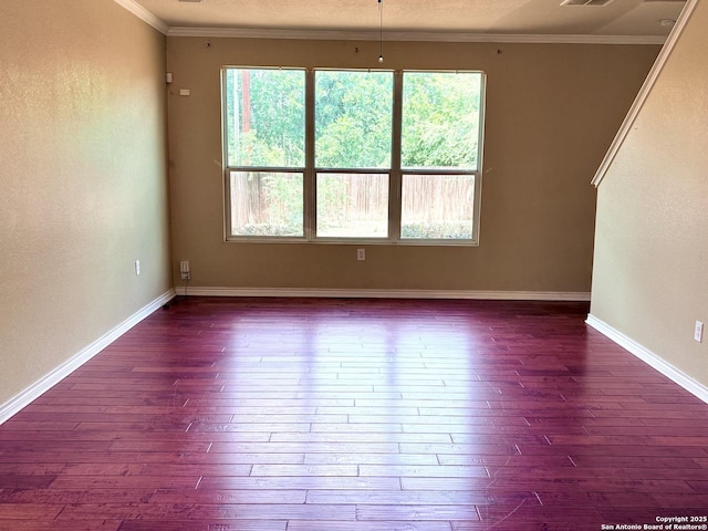 2211 Mission Verde, San Antonio, TX 78223 - empty room featuring dark wood-style flooring, ornamental molding, and baseboards