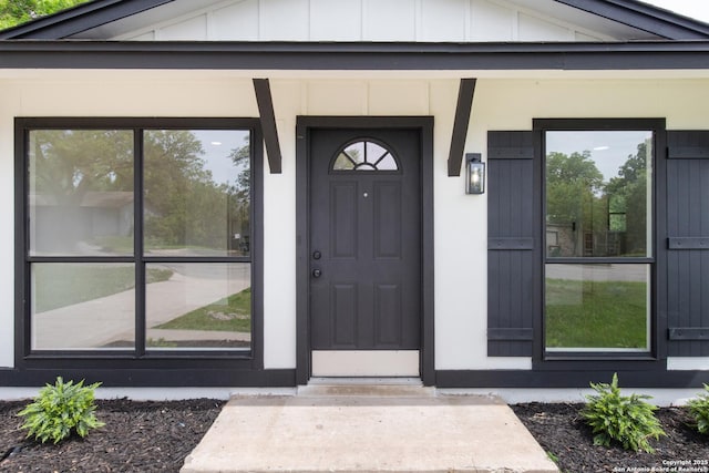 7621 Strolling Ln, Live Oak, TX 78233 - property entrance featuring board and batten siding