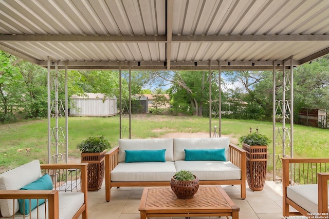 7621 Strolling Ln, Live Oak, TX 78233 - view of patio with outdoor lounge area, a storage shed, and an outdoor structure