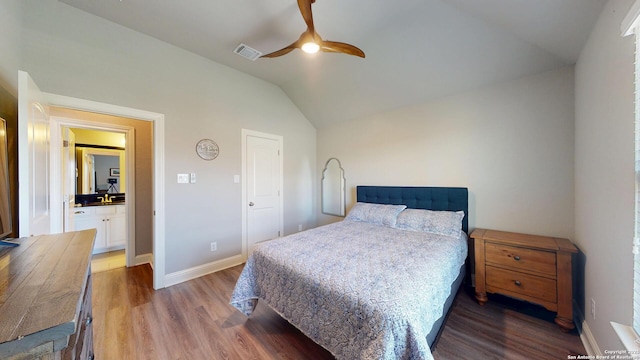 2542 Varrelmann, New Braunfels, TX 78132 - bedroom with vaulted ceiling, wood finished floors, baseboards, ceiling fan, and a sink