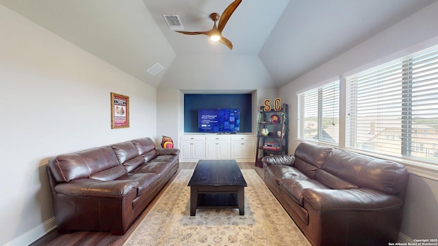 2542 Varrelmann, New Braunfels, TX 78132 - living area featuring ceiling fan, lofted ceiling, wood finished floors, and baseboards