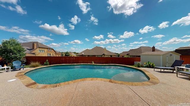 2542 Varrelmann, New Braunfels, TX 78132 - view of swimming pool with a patio area, a storage shed, a fenced backyard, and a residential view