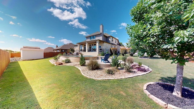 2542 Varrelmann, New Braunfels, TX 78132 - view of yard featuring a patio, an outdoor structure, and a storage unit