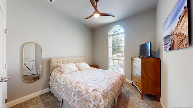 2542 Varrelmann, New Braunfels, TX 78132 - bedroom featuring carpet floors, baseboards, a ceiling fan, and vaulted ceiling