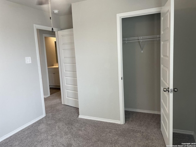 1138 Gracie Way, New Braunfels, TX 78130 - unfurnished bedroom featuring carpet floors, a closet, and baseboards