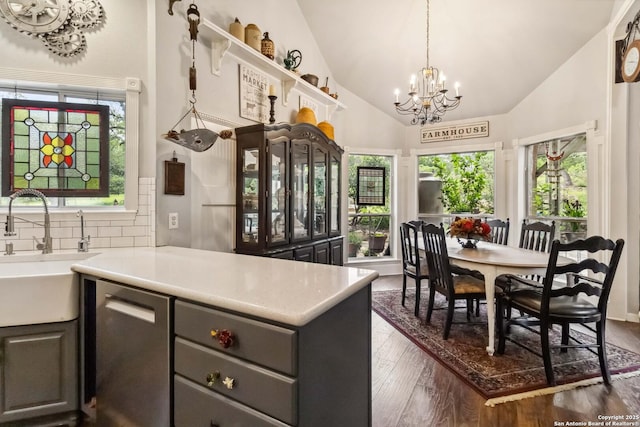 111 Kendall Oaks, Boerne, TX 78006 - kitchen featuring a sink, a chandelier, dishwasher, healthy amount of natural light, and lofted ceiling